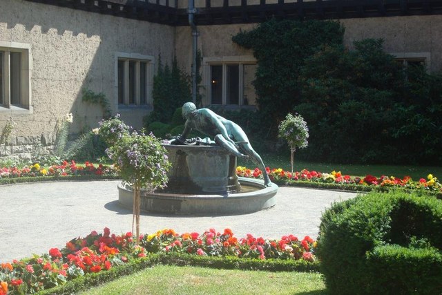 Rather aptly the fountain in Cecilienhof's garden court personifies ...