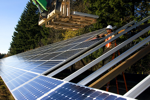 2009-09-17-InstallingSolarPanels_Large.jpg