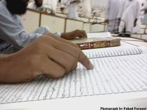 2010-10-16-StudentbrowsingbookofHadithintheclassroomofDarulUloomcopy.jpg