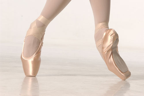 Natalie Portman On Pointe. pair of pink pointe shoes.