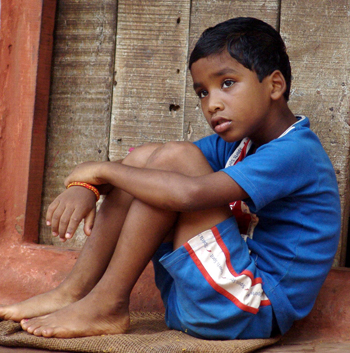 Boy dressed as a girl by mother