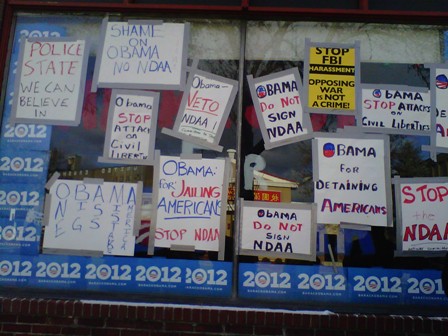 2011-12-24-NDAAprotestsignsatObamasweb.jpg