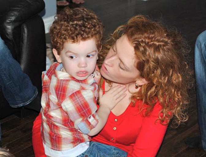 2012-04-21-Mommyhelpinghimplaybyrules.jpg