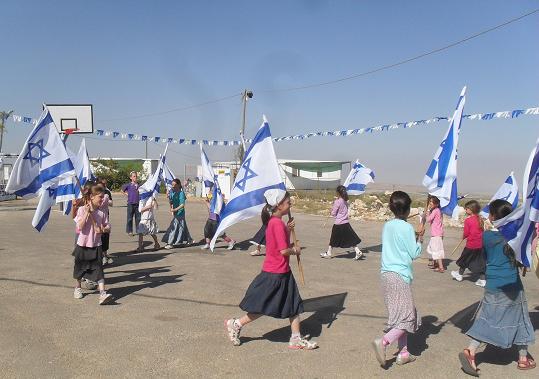 2012-06-15-MigronKidsIsraeliFlags.JPG