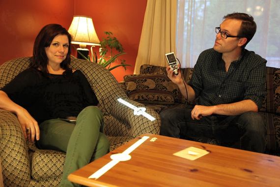 2013-12-05-BNW2EPS4PERFECT_CITYCarin_Bondar_examines_how_infrared_depth_camera_technology_can_create_interactive_touch_screens_on_any_surface_including_her_armchair_and_coffee_table.jpg