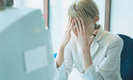 2014-09-11-stressedwomanatwork.jpg