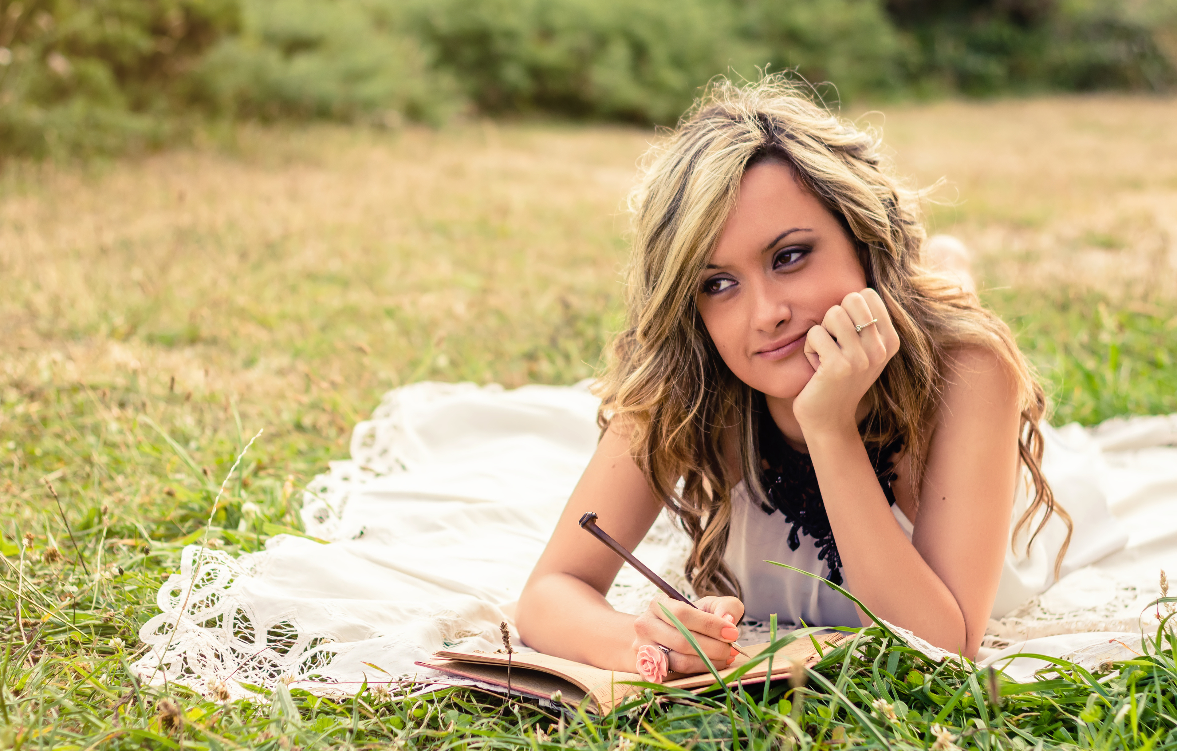 Blonde woman writing in journal - wide 5