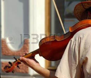 2016-02-08-1454964745-621014-5317141streetviolinistplayingaviolin300px.jpg