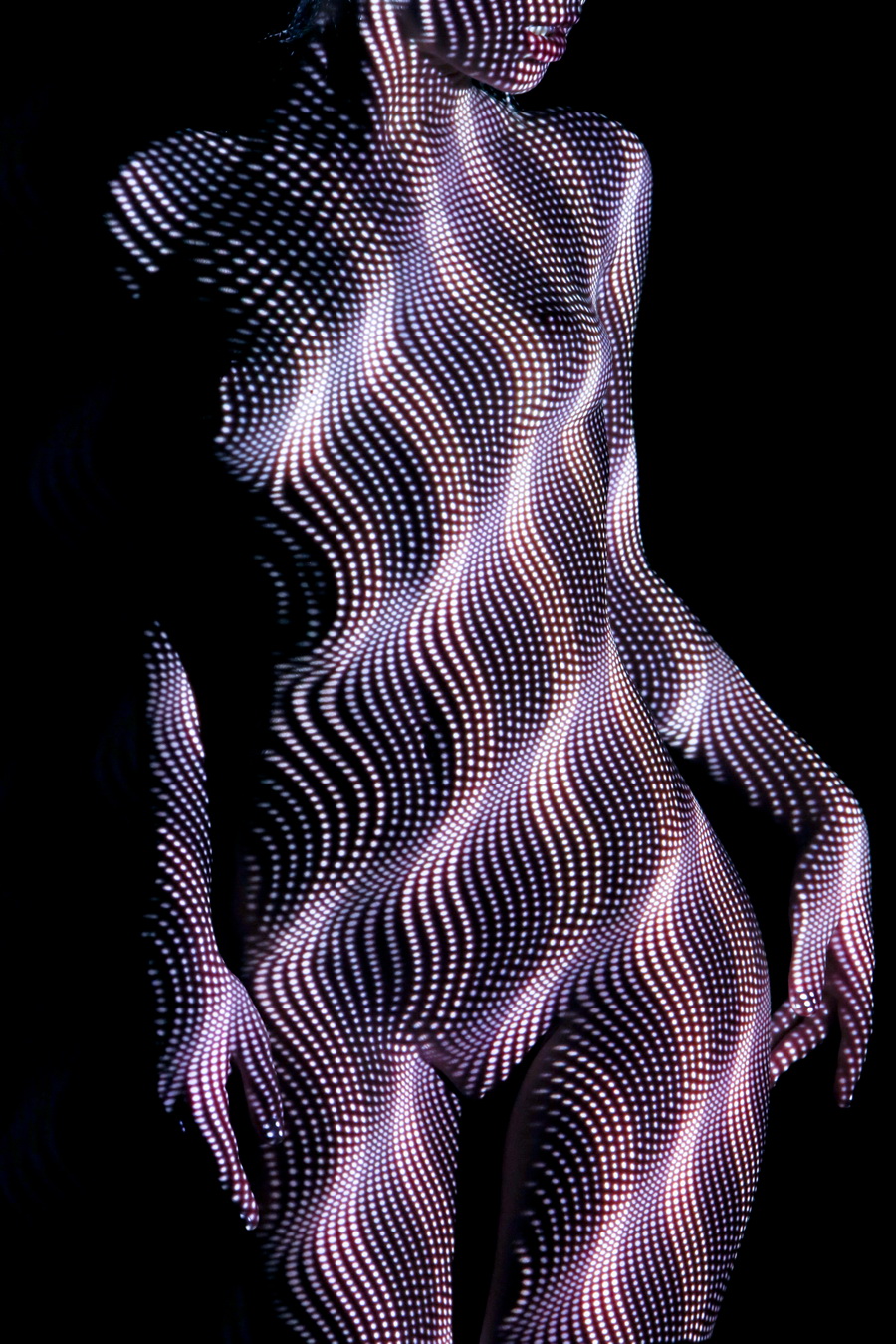 Seductive Photos of the Female Form Dressed Only in Light 