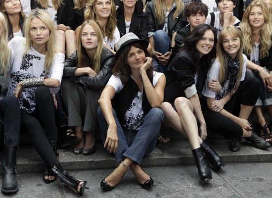 All smile from the models as Helena Christensen takes the centerstage spot