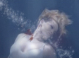 Rihanna's 'Russian Roulette' Video: In A Nude Bra, Bloody (WATCH)