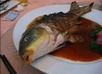 Eating A Deep Fried Fish That's Still Alive (VIDEO)