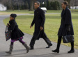 Obamas Return To Freezing Cold Washington (PHOTOS)