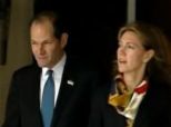 Eliot Spitzer And Wife Silda Leave Apartment In Media Scrum