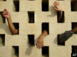 Abu Ghraib Photographer: Excerpts From Her Interviews