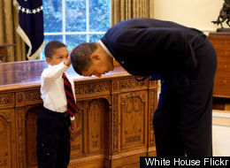 Child Rubbing Obamas Head