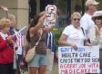 Anti-Obama Protester Compares President To Nazi In Swastika Sign