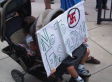 Pelosi Protesters, Including Kid In Stroller, Compare Obama To Hitler