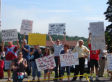 The Funniest Signs From Town Hall Protests (PICS)