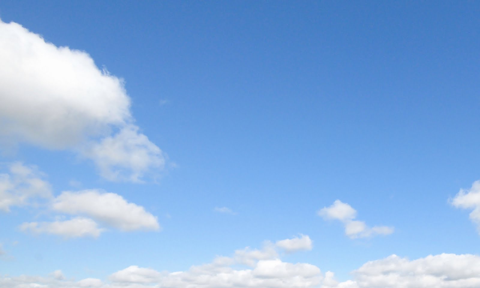 Light Blue Sky With Clouds