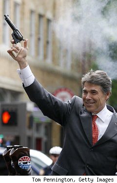 2011-08-22-http:-iamthearbiter.com-wp-content-uploads-gov-rick-perr-govrickperrygun240jdf0428101.jpg