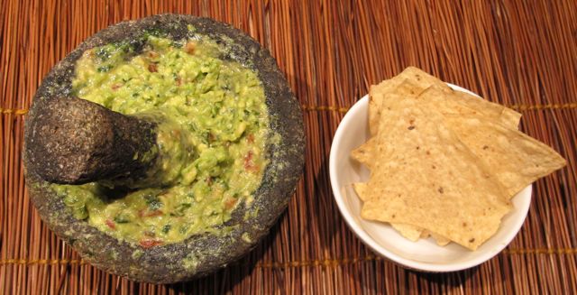 2012-02-21-guacamoledoneinmortarpestlewithchips.jpg