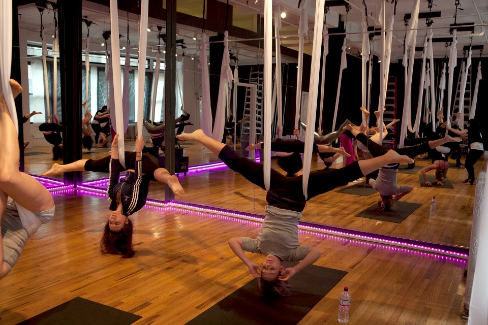 yoga with cloth hanging