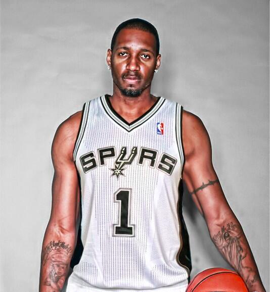 Tracy McGrady sits courtside as he attends the 2023 WNBA All-Star News  Photo - Getty Images