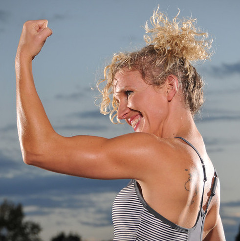 I prefer barbells to bronzer for my so-called sculpting and toning. Photo by John Adkins II