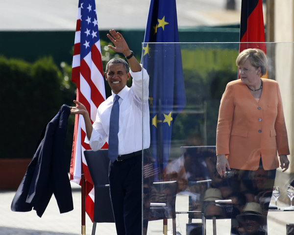 2013-06-25-20130619T140644Z_1859666459_LR2E96J136YQ1_RTRMADP_3_OBAMABERLIN.JPG