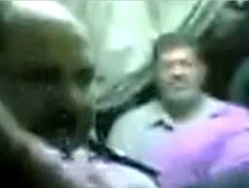 2013-07-07-ScreenshotofvideoshowingpolicearrestingMohamadMorsi.jpg