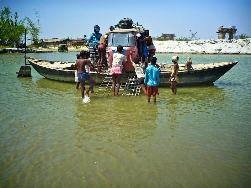 2013-07-25-RickshawOnBoat.jpg