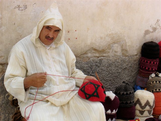 2013-08-06-Moroccomanwithhats.JPG