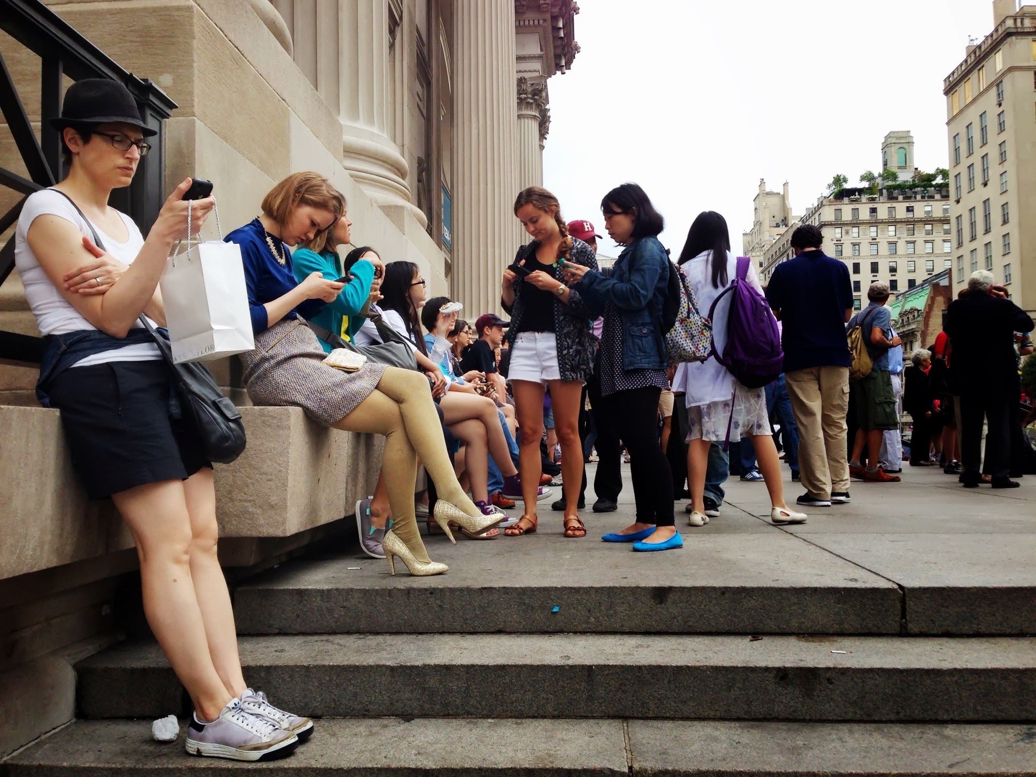 People on the steps of the MET in NYC by Simone Smith