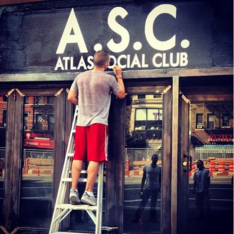 2013-09-08-Pablo Raimondi painting the sign for he and his friend's Atlas Social Club-pABLOPAINTING.jpg