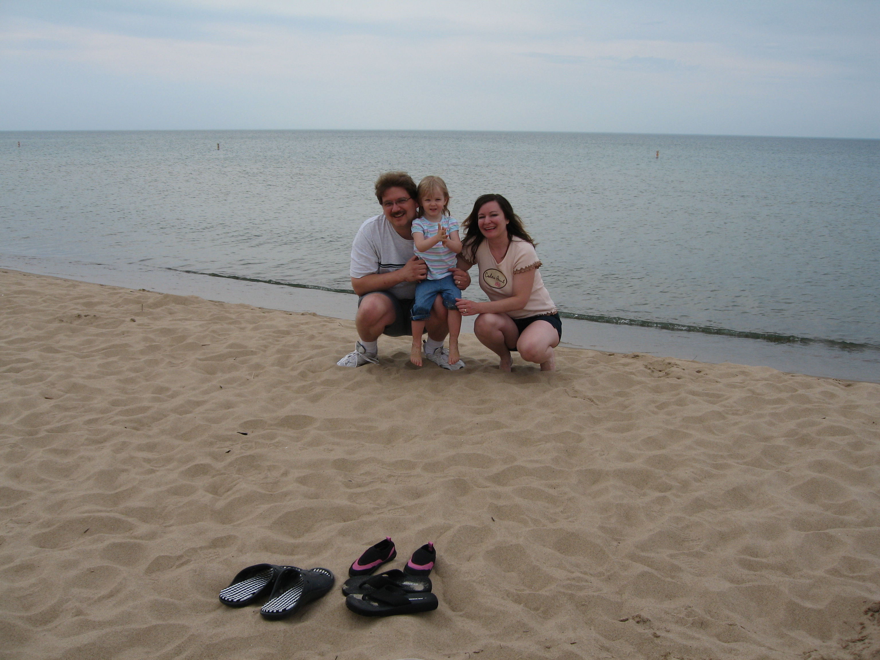 Katie and her parents, Paul and Deanna