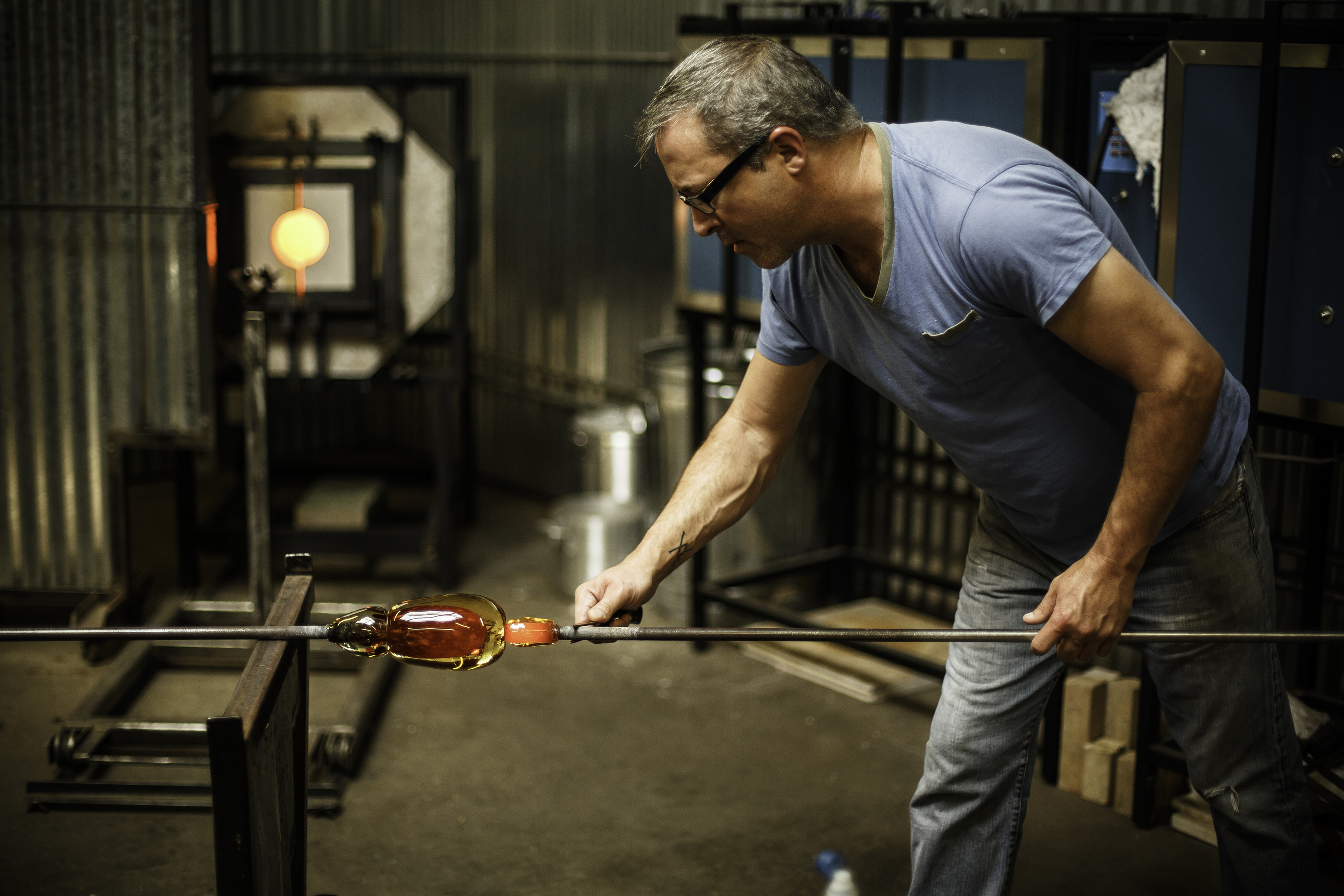 Glass Blowing Workshop - Two Women Shaping glass on the Blowpipe Stock  Photo - Alamy