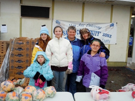 2013-12-17-MaryWithVolunteers.JPG