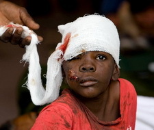 2014-01-03-Boy225_receiving_treatment_after_Haiti_earthquakewikipedia.jpg