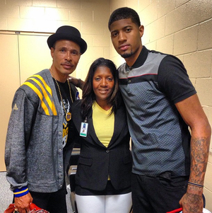 All-Star Paul George (right) with his mom, Paulette, and dad, Paul