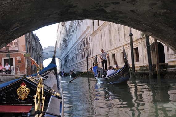 2014-06-03-gondolaunderbridgeofsighsvenice.jpg