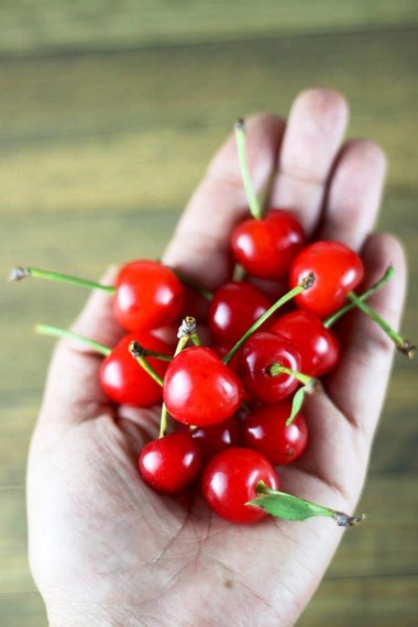 2014-07-01-handfulofsourcherries.jpg