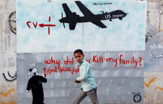 2014-07-03-drone_graffiti_yemeniboy_byMohammedHuwais_325pxw.jpg