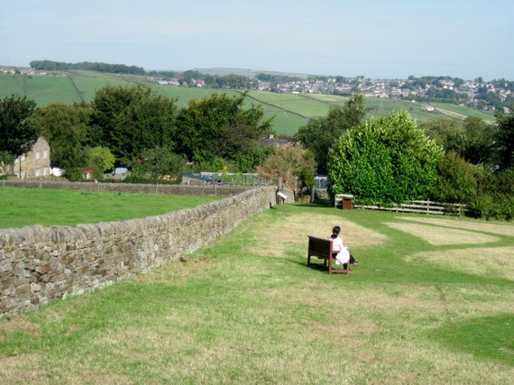 2014-07-21-Yorkshireladysittinginfield.jpg