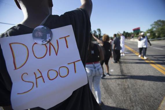 2014-08-22-fergusonprotester.jpg