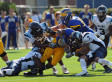 2014-09-23-sFOOTBALLTACKLEsmall.jpg