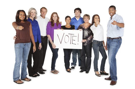 2014-10-22-PeopleStandingAroundVoteSign.jpg