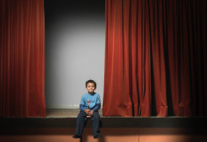 2014-10-22-boy_sits_stage.jpg