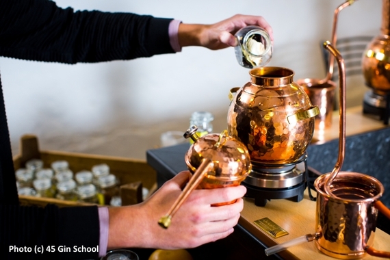 2014-12-02-Jamie_Baxter_Gin_School_adding_Botanicals_to_the_still.jpg