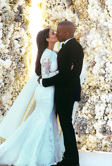 2014-12-18-kimkardashiankanyewestweddingkisshires.jpg